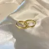 Pendientes de Aro Minimalistas Estilo Francés 2026 Diseño de Nicho Aro Cuadrado de Alta Gama Pendientes de Clip para Oreja sin Dolor tipo Bobina de Mosquitos Modernos