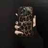 Adecuado para Apple 18Promax Espejo de Vidrio Galvanizado Estampado de Leopardo Corazón de Amor Cordón iPhone Teléfono Móvil Estuche Blando y Duro Personalización