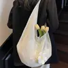 Bolso tejido 2026 nuevo de gran capacidad para vacaciones en la playa, con correa para el hombro, hilo de algodón y diseño de malla hueca para mujer