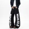 Jeans Scimitar com Estampa de Letras Estilo Rua Americano para Homens e Mulheres, Calça de Perna Larga Estruturada Vintage Solta com Design Único de Patchwork
