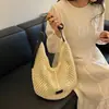 Bolso tejido hueco de moda para mujer, nuevo modelo 2026, bolso de playa para vacaciones junto al mar, bolso de hombro y cruzado de gran capacidad