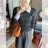 Suéter de punto negro sintético de dos piezas OEM para mujer, nuevo estilo corto ajustado de otoño e invierno 2026 con cuello tipo polo y mangas largas