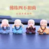Cuentas de Buda creativas, pequeñas figuras de monjes, manualidades de resina, decoraciones de interior de coche de dibujos animados, adornos de coche de alta gama para hombres y mujeres