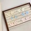 Aretes de Flor de Gota de Aceite Flor de Ciruelo Esmalte Estilo Nacional Lujo Ligero Nuevos Chapados en Oro Electrochapado Elegantes de Alta Gama para Mujer