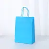 Punto 26 Color sólido Bolsa de mano de papel Kraft para llevar a mano Bolsa de regalo Bolsa de papel de envolver estilo Ins venta al por mayor
