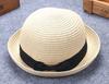 Versión coreana de sombrero de sombrilla de marea de primavera y verano para niños, sombrero de paja con lazo rizado, sombrero de protección solar de playa con cúpula, venta al por mayor