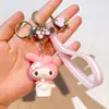 Llavero Creativo Sanrio Cuna Serie Kuromi Muñeca Linda Máquina de Regalo Llavero para Hombres y Mujeres