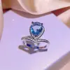 Comercio Exterior Transfronterizo Exquisita Joyería Incrustada con Diamante Azul Gota de Agua Collar Pendientes Anillo para Mujer Juego de Tres Piezas Colgante de Joyería Venta al por Mayor