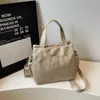 Bolsa casual, simples e estilosa, novo design de nicho de luxo leve, alto valor estético, grande capacidade, multi-compartimentos, de ombro, transversal, bolsa de mão