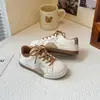 Tênis infantis 2026 primavera e outono novos modelos populares, nova moda universitária estilo chinês de alta aparência, tênis de treino alemães para meninas e tênis Forrest Gump