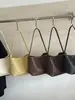 Bolso de mano de moda de nicho con patrón tejido para mujer, nuevo bolso tipo cubo estilo vintage, bolso de hombro para llevar bajo el brazo