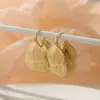 [Luz Flutuante e Dourado] Outono e Inverno Novo Novo Estilo Chinês Folha de Ginkgo Vazada Borla Repelente de Mosquitos Disco Clipe de Orelha Brincos de Atmosfera