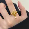 Nuevo Anillo Colgante de Flor de Iris Cruzada con Circonita de Estilo Minimalista Retro de Nicho para Mujer, Anillo Abierto Versátil de Gama Alta para Mujer