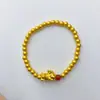 Pulsera tejida hecha a mano para el año de nacimiento, Pulsera de hilo dorado arena rojo al por mayor, Hazte rico inmediatamente, Tejido de bolsa de la suerte del Dios de la Riqueza amarillo