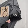 Bolso cruzado de hombro de moda y único de Shuai Mi Temporada 2026 Nuevo Modelo Bolso de mano informal moderno para mujer Bolso cuadrado pequeño