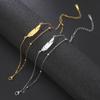 Pulsera de acero inoxidable para mujer, con colgante de pluma de doble agujero, cadena de cuentas dobles apiladas de acero de titanio simple, de moda europea y americana