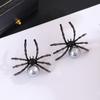 Pendientes de Halloween con diseño de araña de viento oscuro exagerados, estilo gótico punk, con perlas y personalidad, de estilo transfronterizo europeo y americano.