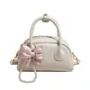 Bolso de mano único, casual y elegante, tipo concha para mujer, nuevo modelo primavera 2026, bolso de hombro y cruzado de lujo ligero de alta calidad