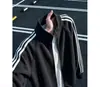 Chaqueta cárdigan azul oscuro de tres rayas para hombre primavera y otoño cleanfit cuello alto chaqueta de béisbol sudadera con capucha de retazos a rayas