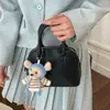 Mini Bolso de Concha para Mujer 2026 Nuevo Nicho de Gama Alta Bolso de Bolos de Moda Mini Bolso de Mano Bolso Bandolera para Mujer