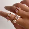 Anillo Dazan al por mayor en stock de Acero de Titanio con Galvanizado de Oro Real 18K, Cuadrado de Gota de Agua Abierto con Circonita, Transfronterizo Europeo y Americano Ins
