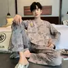 Nuevo conjunto de pijama casual para hombre de primavera y otoño, con un diseño de manga larga, corte holgado y estilo coreano que se puede usar como ropa de estar en casa o incluso como ropa exterior.