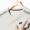 Camiseta waffle de manga larga para hombre, moda impresa, cuello redondo, primavera y otoño, fina, color liso, camiseta interior, moda