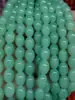 Atacado 8*10mm contas de cristal lisas contas soltas imitação de jade Hotan imitação de jade Dongling contas ovais contas de imitação de jade