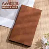 Cuaderno pequeño A6 bloc de notas de bolsillo diario de oficina de negocios engrosado personalizado portátil cuaderno A6