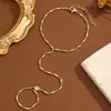 Cadena de dedos de moda transfronteriza estilo INS, pulsera de cadena de anillo de circonita chapada en oro real de cobre, joyería personalizada de moda al por mayor para mujeres