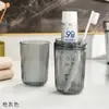 Taza de tocador de viaje de suministro directo transfronterizo, Taza para enjuagar el cepillo de dientes, Portacepillos de dientes portátil estilo Ins, Taza de pasta de dientes