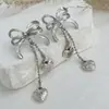 Brincos Europeus e Americanos Transfronteiriços Doces Frescos com Laço de Diamante e Franjas Estilo Ins Feminino Corrente de Metal Pingente em Forma de Coração