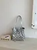 Bolso de mujer de moda, nuevo modelo 2026, bolso de mano versátil para el día a día, estilo casual simple de lunares, bolso cruzado tipo cubo de moda