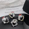Pendientes de botón de oso de Navidad 2023 otoño e invierno lujo ligero pendientes de botón con microincrustaciones de estrella de cinco puntas pendientes de moda de alto sentido joyería de oreja