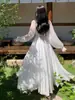 Vestido de Vacaciones en la Playa Sanya Estilo Nuevo 2026, Vestido de Playa Blanco de Gasa de Alta Gama con Dobladillo Grande, Vestido Ultralargo