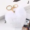Llavero de Bola de Peluche Arcoíris Llavero con Borla en Forma de Corazón Grande para Mujeres Colgante para Coche Bolso Joyería de Moda