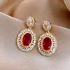 Pendientes Vintage Estilo Hong Kong 2026 Nuevos Pendientes de Botón Metálicos de Alta Gama Moda de Nicho Pendientes Versátiles Venta al por Mayor para Mujeres