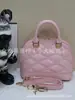 Bolso de Mano Clásico Popular de Comercio Exterior Cuero Genuino Bolso de Mujer Bolso Cruzado de Hombro de Alta Calidad Bolso tipo Concha para Mujer Marca Grande Productos de Guangzhou