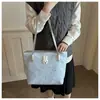 Bolso tote grande de mujer transfronterizo, nuevo modelo primavera 2026, adecuado para el trabajo y los desplazamientos, elegante bolso de hombro y para llevar bajo el brazo