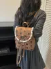 Mochila de encaje con lunares de nuevo estilo 2026 transfronteriza con cordón de lazo, mochila de nicho suave para el día a día
