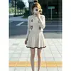 Nuevo conjunto de estilo coreano, un look suave y relajado, extremadamente elegante, conjunto de dos piezas de cárdigan de punto y falda corta