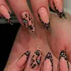 Item de alta venda no comércio exterior 24 peças nail art outono e inverno tom de pele nude cabeça de leopardo pintada à mão estampa de leopardo garota ousada unhas longas amêndoa postiças atacado