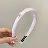 Coreia do Sul nova cor de laço de prata tecido esponja faixa de cabelo doce moda versão estreita faixa de cabeça adorno de cabeça acessórios de cabelo