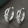 Hebilla de Oreja de Circonita Amor Transfronterizo Corea del Sur Temperamento Sentido de Alta Gama Anillo de Oreja Francés Nudo Diseño de Nicho Arete para Mujer