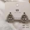 Pendientes de plata 925 chapados en oro y cobre con hebilla de oreja hueca de estilo exagerado con personalidad de Europa y Estados Unidos al por mayor transfronterizos para mujer