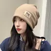 Gorro de punto para mujer de otoño e invierno con bordes enrollados, versátil, cálido y resistente al frío, adecuado para cabezas grandes, cubreorejas y diseñado para mantener la cabeza caliente
