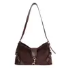 Bolso de mujer de ante vintage de alta gama de gran capacidad para cruzar fronteras, nuevo bolso de hombro cruzado casual para el día a día 2026