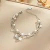 Pulseira de aço titânio para corpo inteiro, venda quente transfronteiriça, feminina, luxo leve, temperamento coreano, galvanoplastia de ouro 18K real, joias no atacado