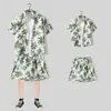 Camisa floral de manga corta, Ropa de playa de Hainan, Estilo hawaiano de Sanya, Conjunto de pantalones cortos finos de verano para hombre y pareja de viaje a Tailandia