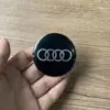 Pegatina de tapa de cubo de rueda de coche 56MM directo de fábrica logo de coche pegatinas decorativas para volante pegatina metálica para coche logo de modificación de volante